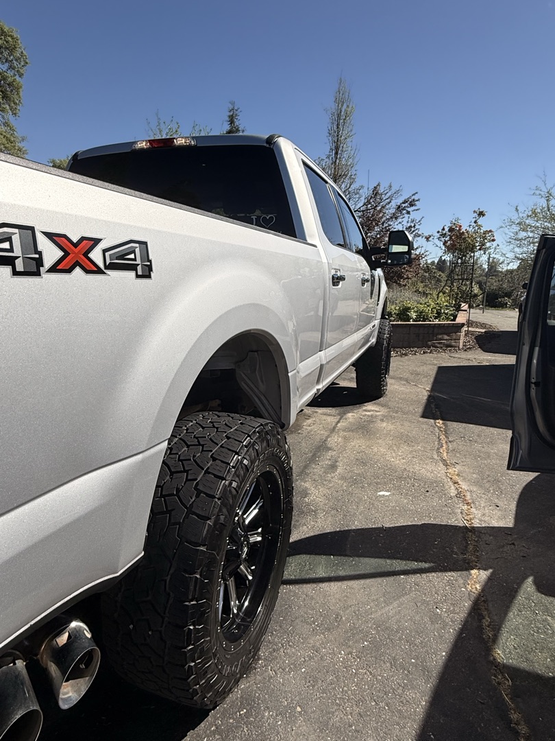 Silver lifted Ford F-150 after full exterior detail by Skyline Detailing