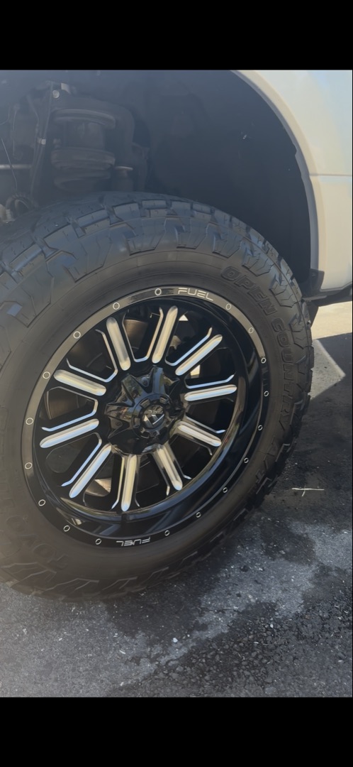 Fuel wheel and tire close-up on lifted truck